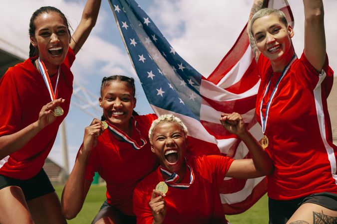 Woman soccer team celebrating championship victory