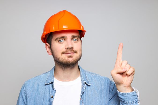 Young man civil engineer in safety hat