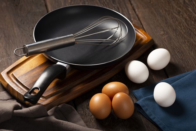 Chicken eggs go up on the table.