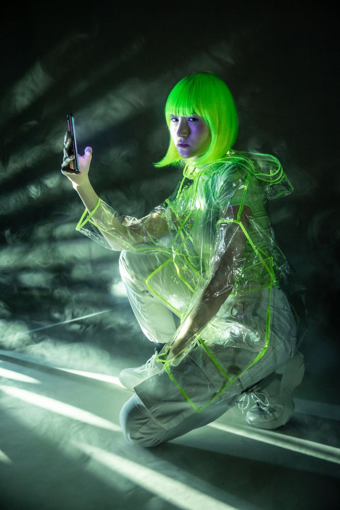Asian young woman using phone