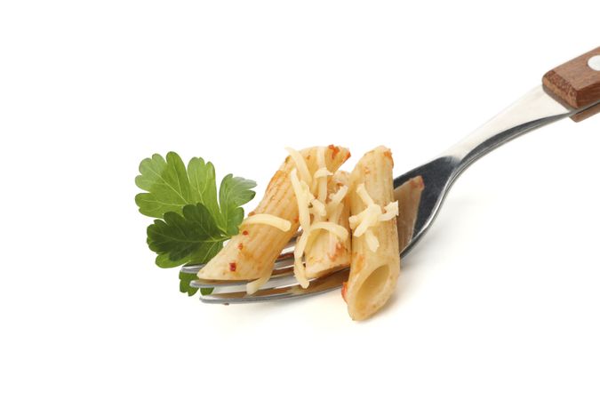 Fork with tasty pasta isolated on blank background