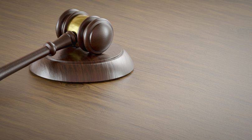 Gavel Resting on a Table with Room For Text.