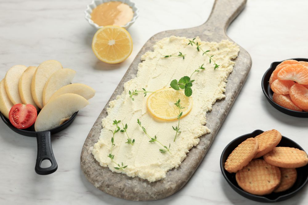 Butter Board with Fresh orange, Cookies, and Mini Croissant.