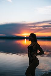 woman against sunset sky on beach