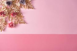 Layout made with pastel pink and purple flowers and gold leaves