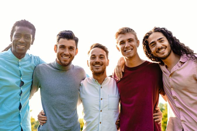 Multiracial group of friends smiling