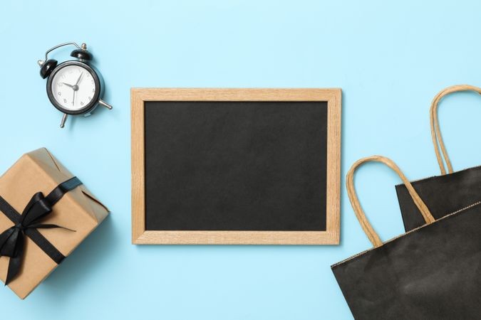 Sale concept with chalkboard on blue background