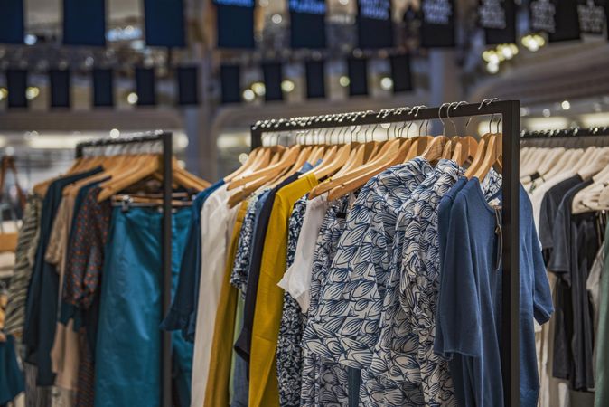 Clothes racks of men's casual outwear in fashion store