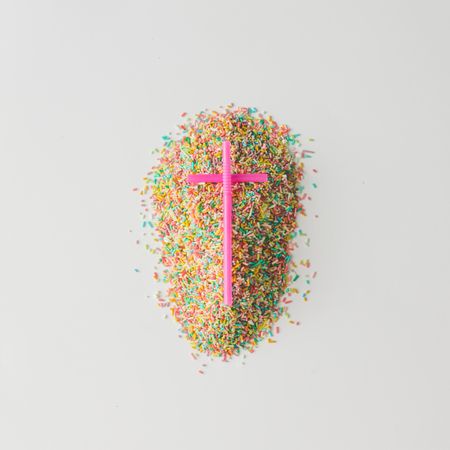 Grave made of colorful cake sprinkles and straws