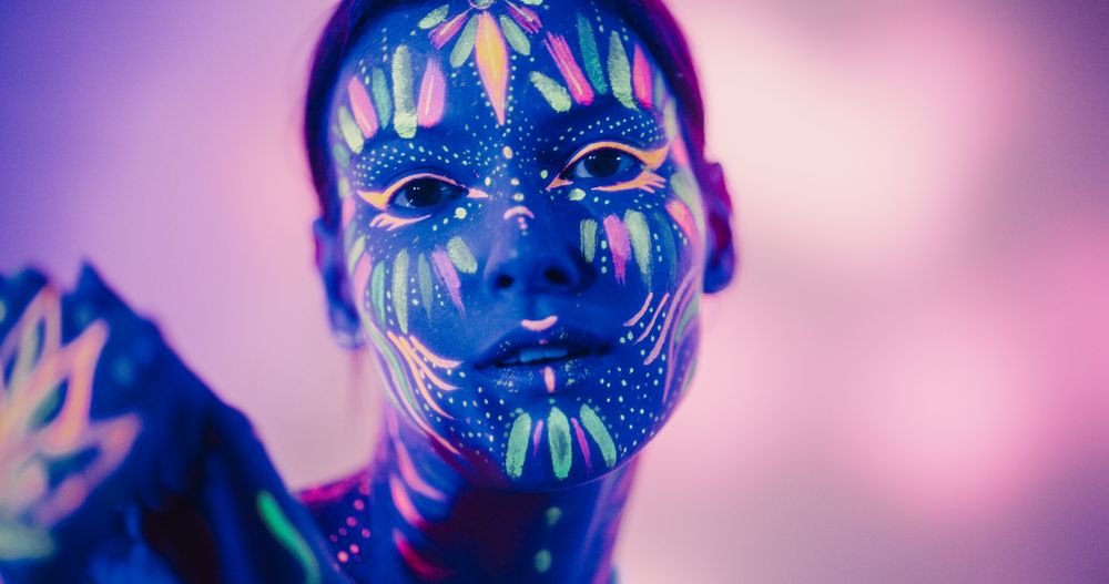 Young Woman's Modern Dance Choreography Unfolds on a Dark Stage with Creative Background.