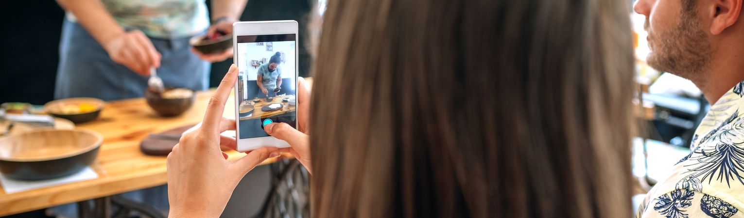 Young cook giving a cooking workshop