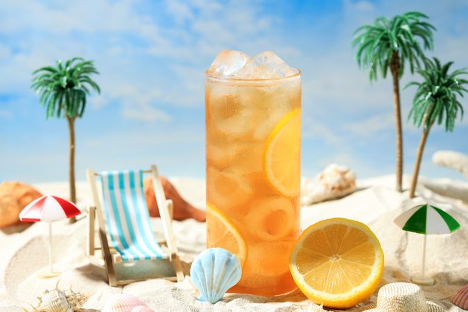 Iced Lemon Tea on High Tall Glass in the Beach Miniature Concept