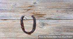 Lucky rusty horseshoe for St Patick holiday on wood 0Ja1nb