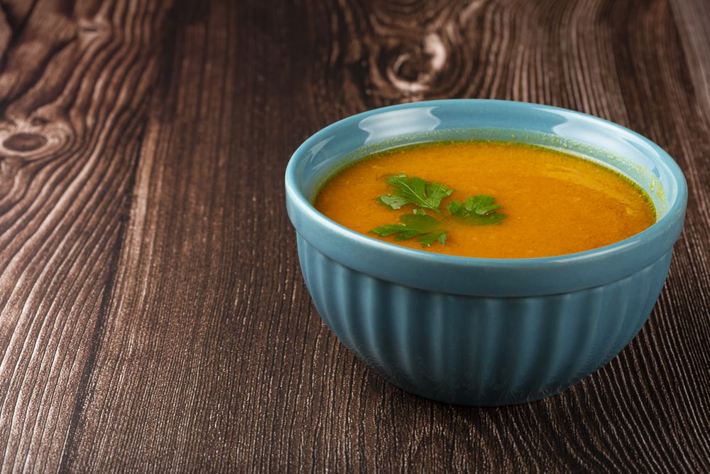 Delicious homemade pumpkin soup in bowl.