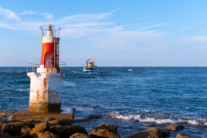 Lighthouse on rocky coastline