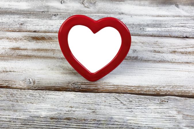 Valentine’s day heart picture frame on desktop
