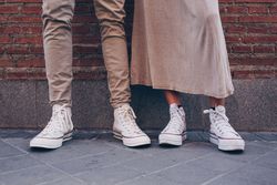 Crop view of couple feet in street