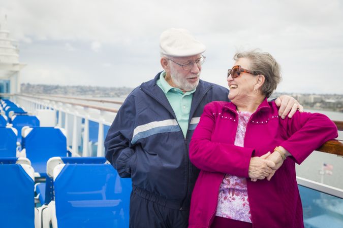 Mature Couple Enjoying The Deck of a Cruise Ship