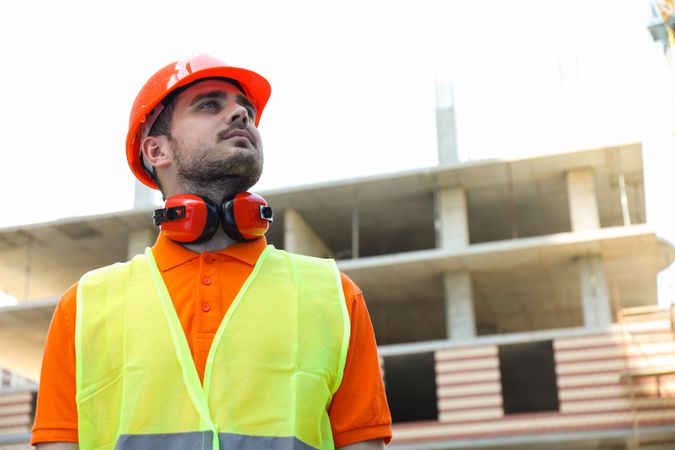 Young man civil engineer in safety hat