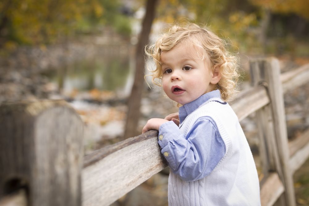 Adorable Young Boy Playing Outside