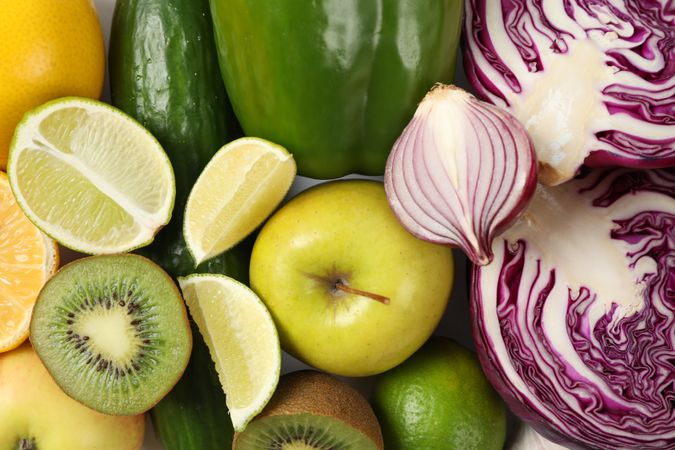 Different vegetables and fruits on blank background, top view
