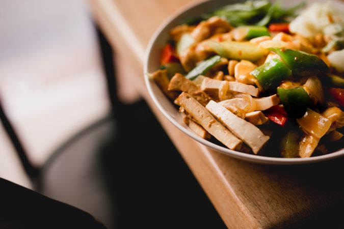 Bowl of prepared tasty vegetarian dish in cafe
