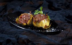 Delicious baked artichokes on plate