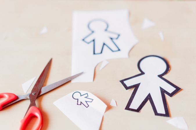 Funny paper toys near scissors
