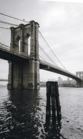 Grayscale photo of Brooklyn bridge