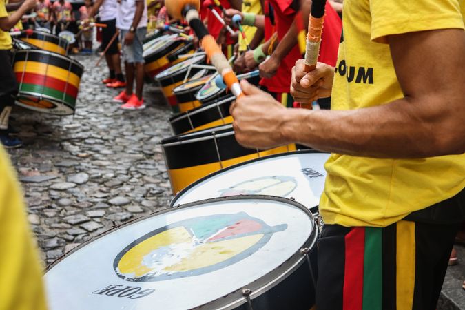 Men playing drums at a festival in Brazil