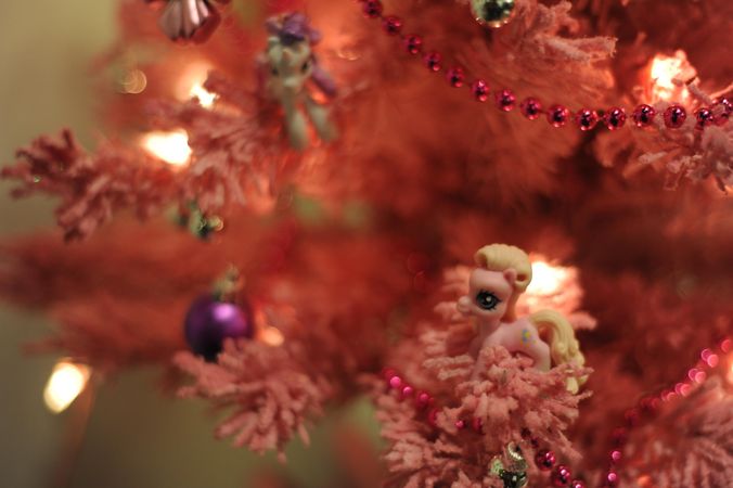 Pink Christmas tree with toy pony ornaments