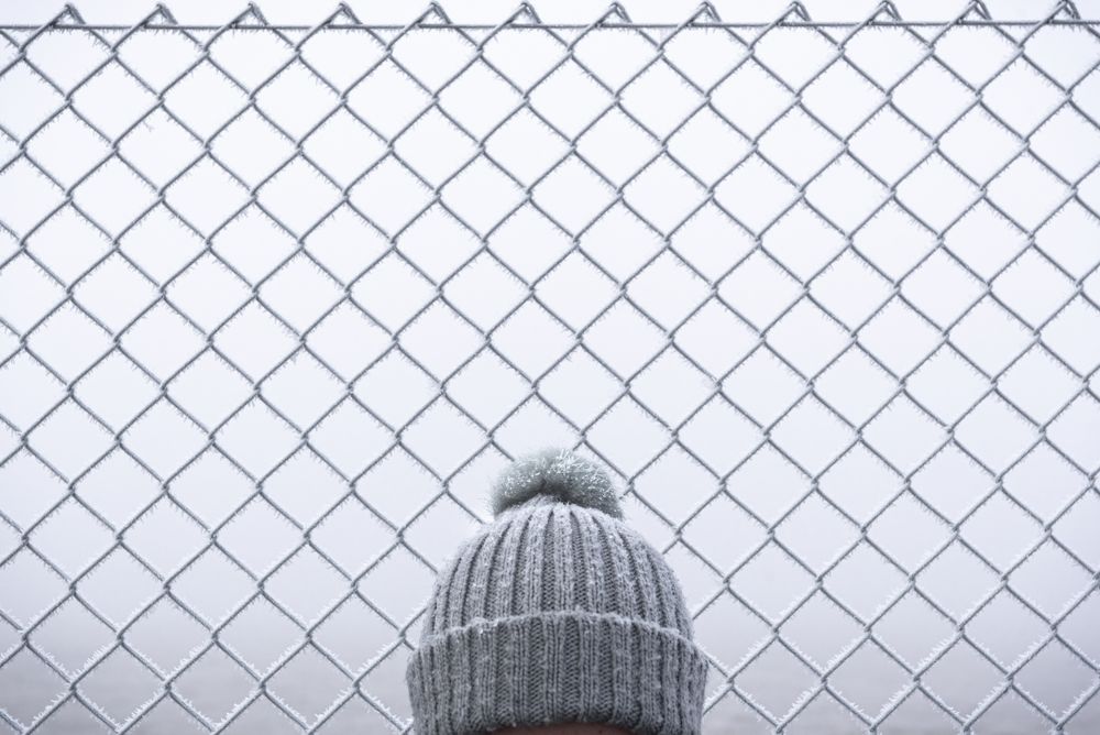 Faceless body infant of fence