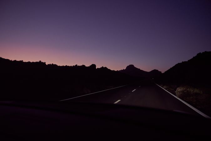 Road in nature at night time
