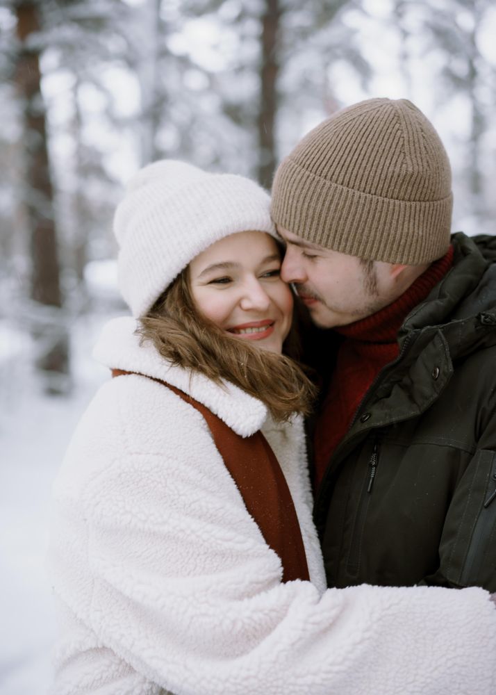 Man and woman hugging and kissing