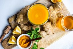Top view of ingredients for detox tea on wooden board