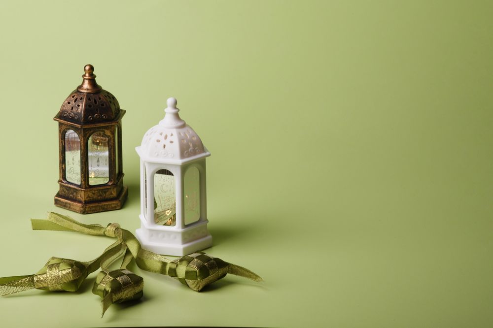 Decorative Lanterns and Ribbons on Pastel Background for Eid Celebration