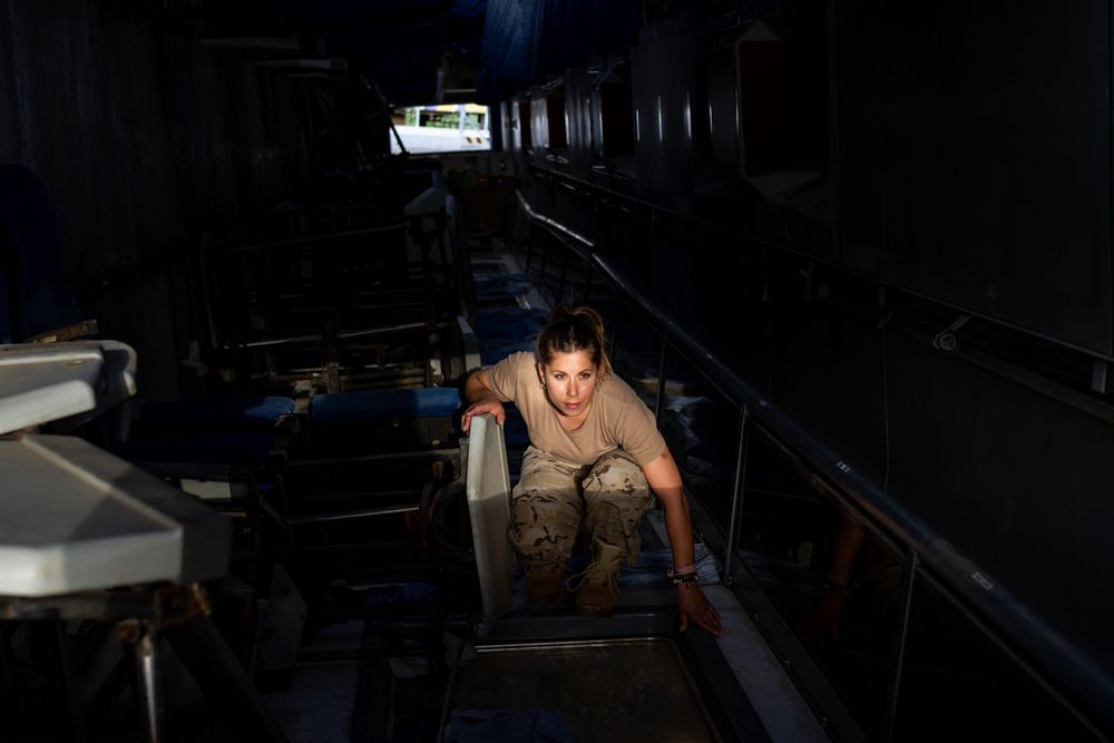 Military woman inside vehicle