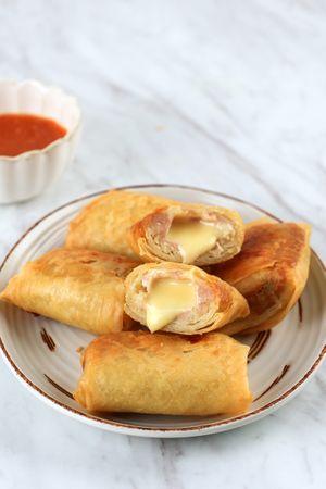 Dimsum Goreng Keju, Fried Dim Sum Filled with Melted Cheese Wrap in Spring Roll Skin.