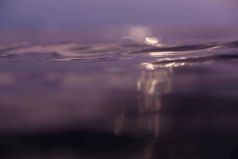 Water wave and cloudy sky