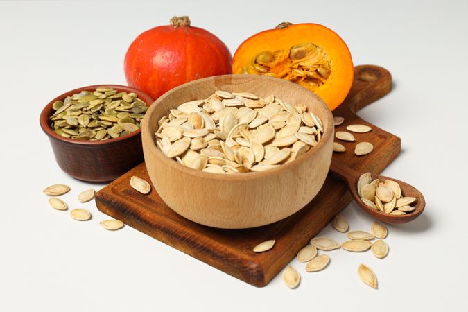 Cooking ingredients for fall season - pumpkin seeds, pumpkin