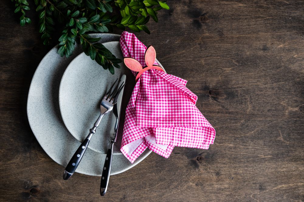 Spring table setting with pink napkin in rabbit