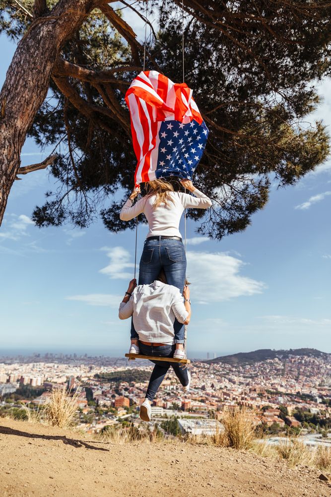 Two women with an American flag
