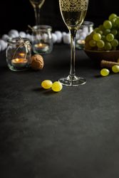 Glasses with wine and grapes