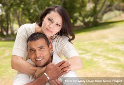 Attractive Hispanic Couple in the Park 426jMK