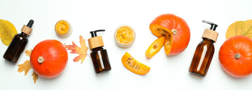 Concept of different cosmetic products, Pumpkin cosmetics, top view