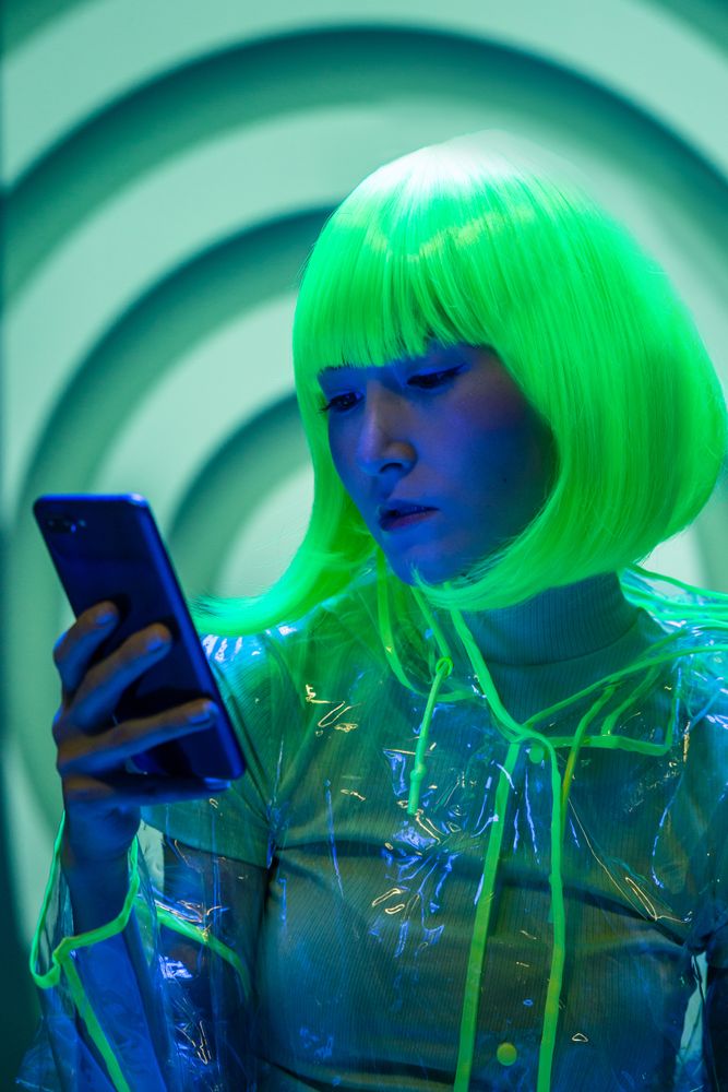 Asian young woman using phone