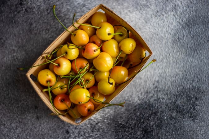 Basket of yellow cherries