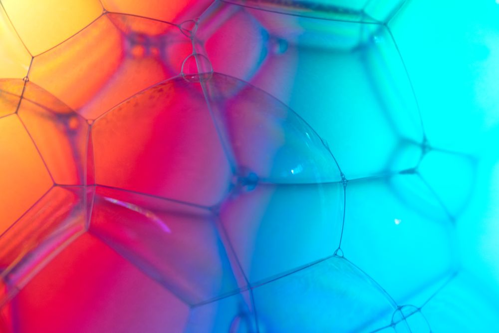 Abstract background bio technology, macro photography foam and water with gradient background. Molecule multicolor backgorund