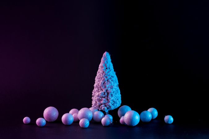 Snowy Christmas tree and baubles in vibrant bold gradient holographic colors