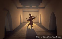 Silhouette of Thai person dancing in a hallway 5kMpQb